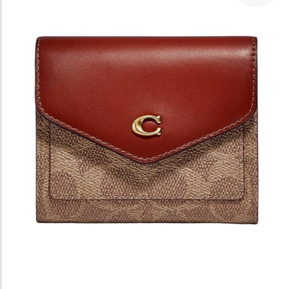 Coach purse and wallet!! Got for Christmas. Used a handful of times.